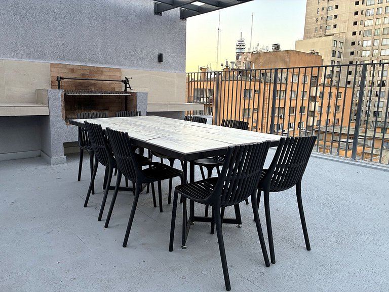 Estudio con terraza privada cama king y escritorio en Santia