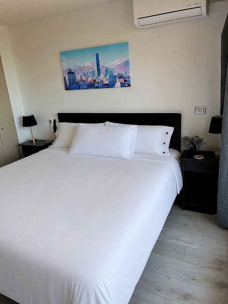 Estudio con terraza privada cama king y escritorio en Santia