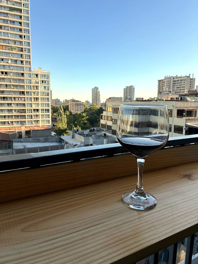 Estudio con terraza privada cama king y escritorio en Santia